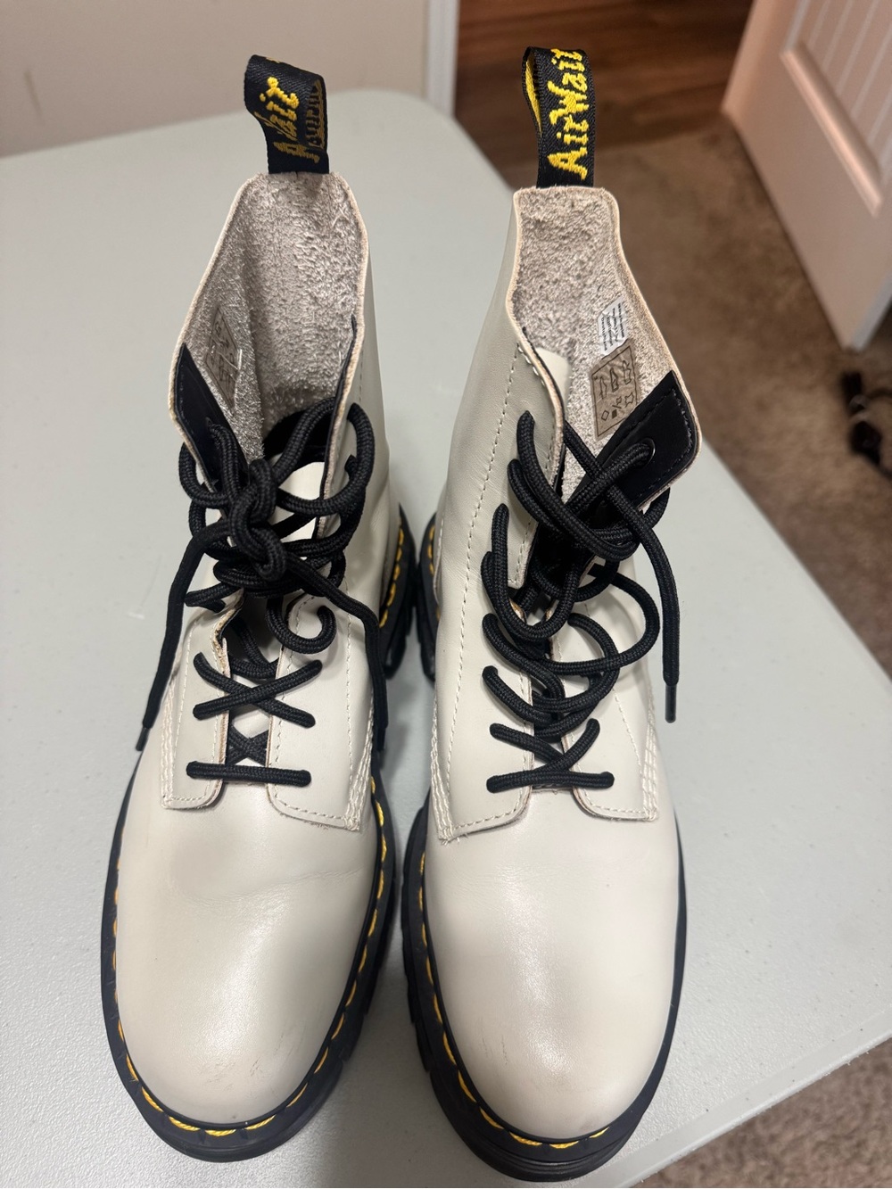 Dr. Martens Cream Leather Lace-Up Boots with Black Accents